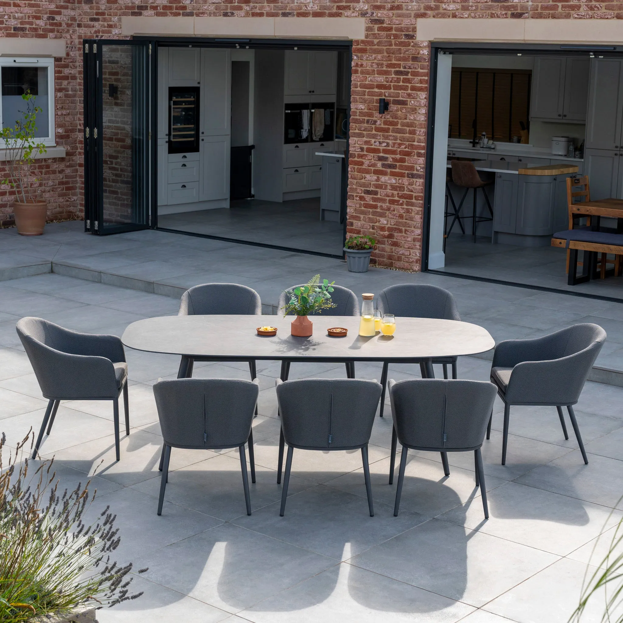 Luna 8 Seat Outdoor Fabric Oval Ceramic Dining Set in Grey